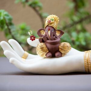 Ganesha with flute on hands